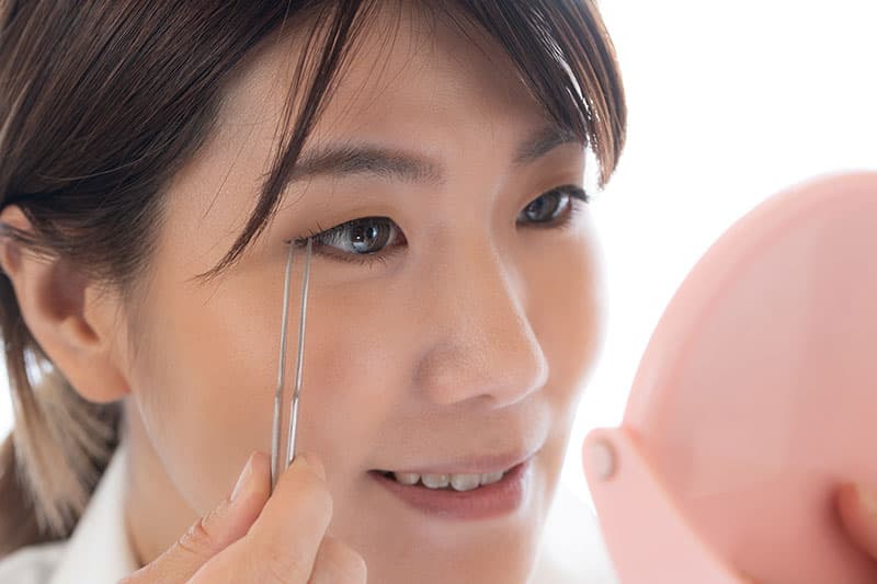 Woman smiling after successful brow lift