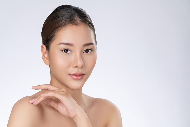 Woman looking radiant after cheek lift
